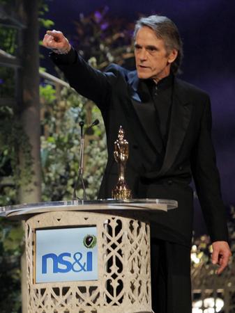 Screen captures and photos of Jeremy Irons presenting at the Classical Brit Awards 2010